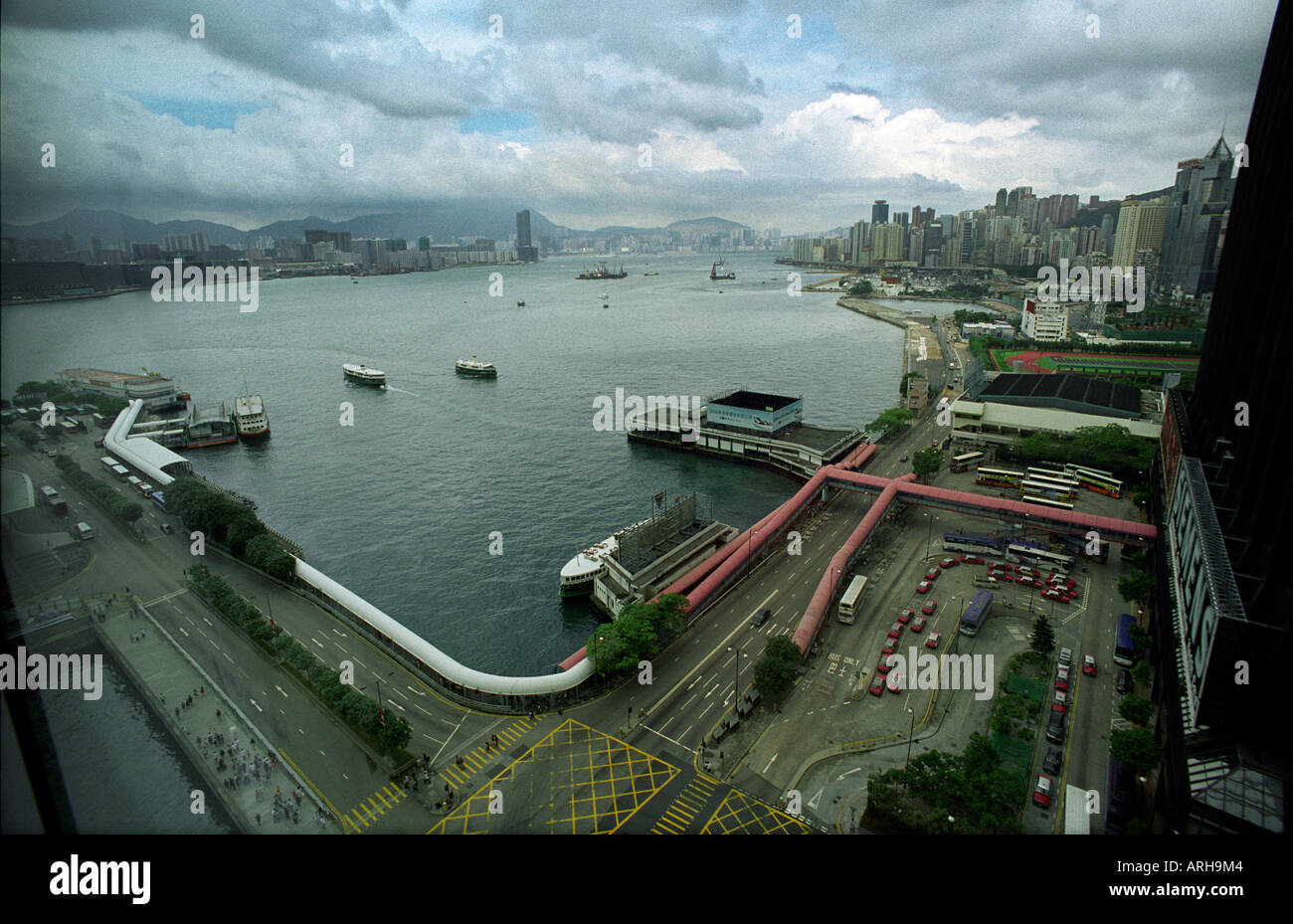 HONG KONG WANCHAI FERRY PIER FOR STAR FERRY BUILDINGS PEOPLE AND STREET ...