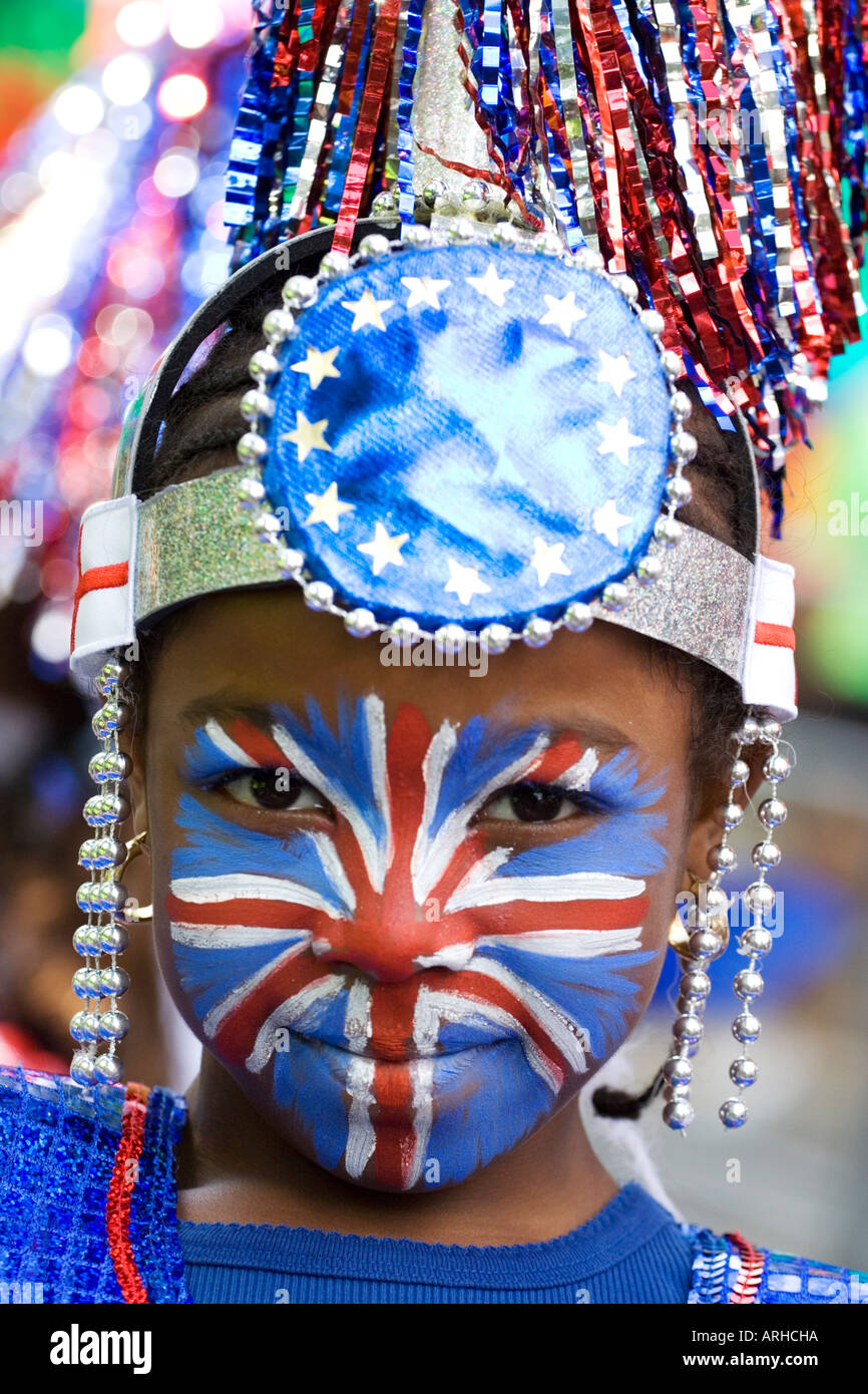 Little girl with a Union Jack painted onto her face and a EU symbol at the Notting Hill Carnival