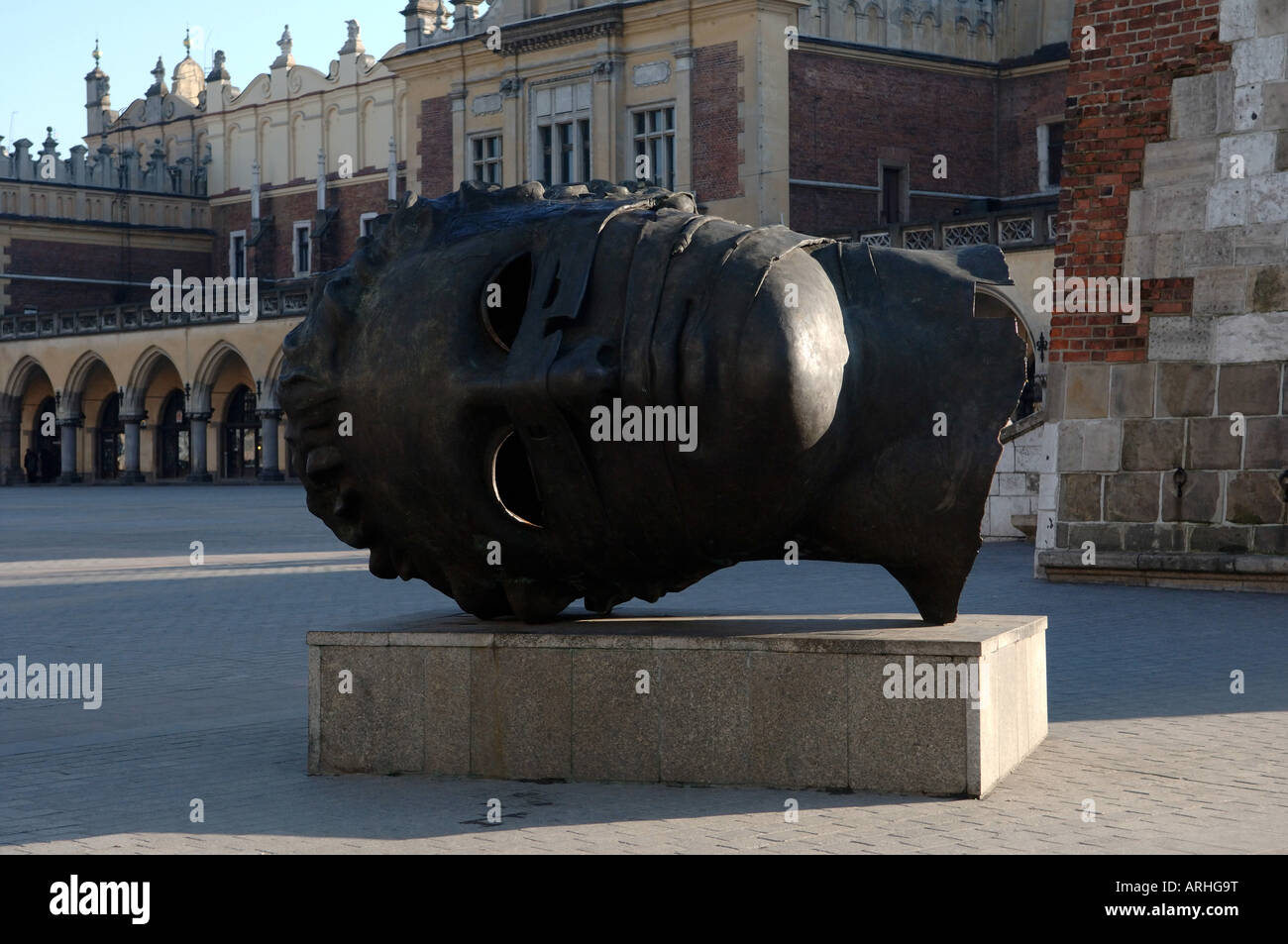 Head sculpture Rynek Glowny main square Krakow Stock Photo Alamy