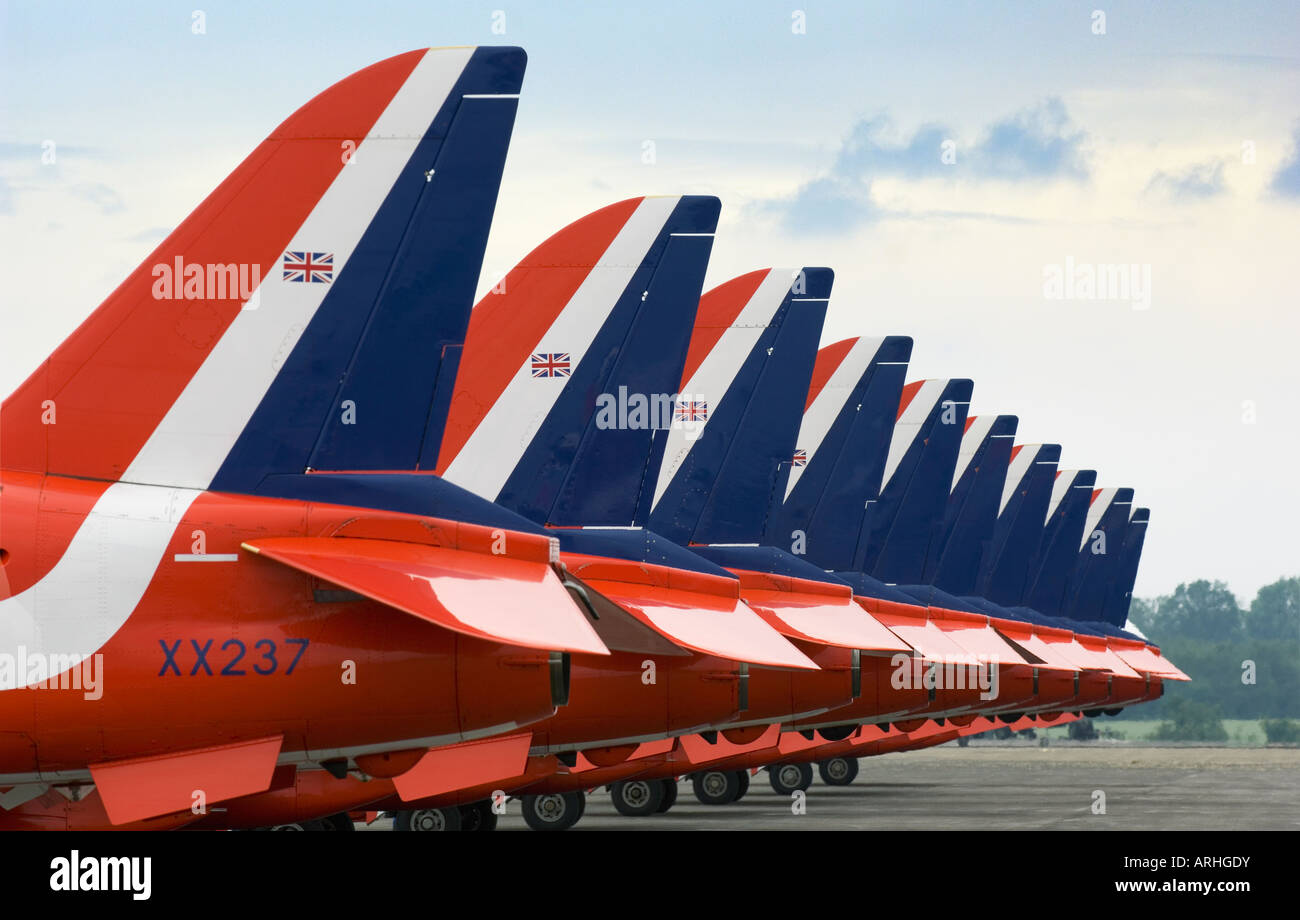 The Red Arrows RAF formation display team Hawk aircraft parked tails aligned on the pad Stock Photo