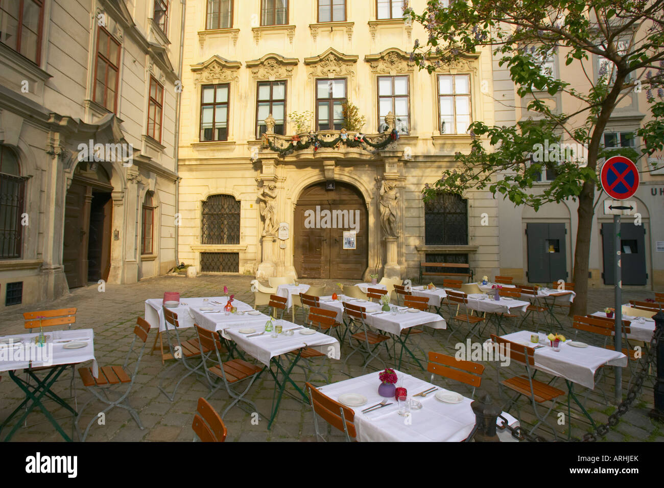 Tables prepared for Lunch outdoors in Vienna, Austria Stock Photo - Alamy