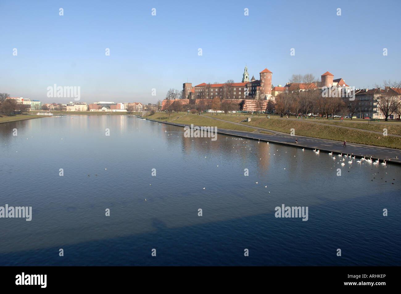 View of Wawel Hill castle and cathedral from bridge over River Wista Krakow Poland Stock Photo