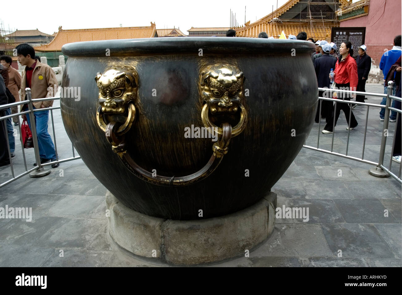 A large gilded bronze vat that held water for extinguishing fires with most of the  gilding scraped off, Forbidden City, Beijing Stock Photo