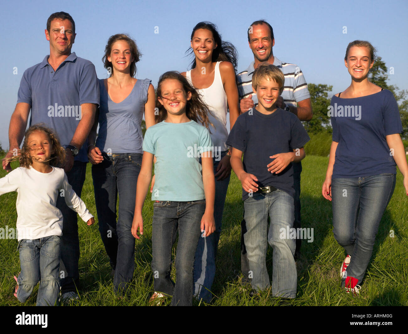 Group of people and children walking Stock Photo