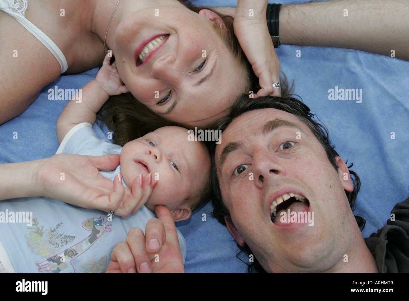 First Child, new family, baby, mum, dad Stock Photo - Alamy