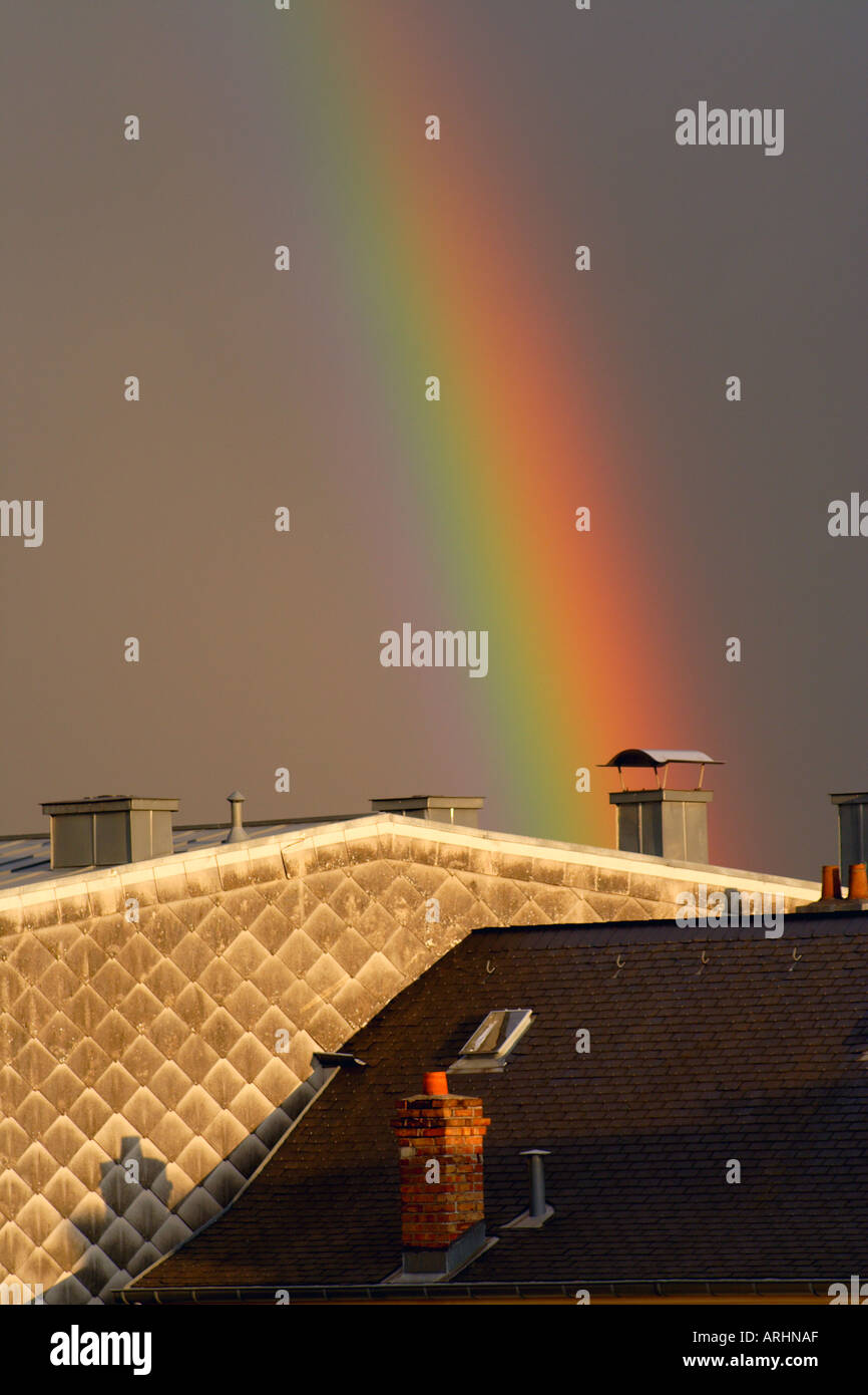 Rainbow above a house Stock Photo