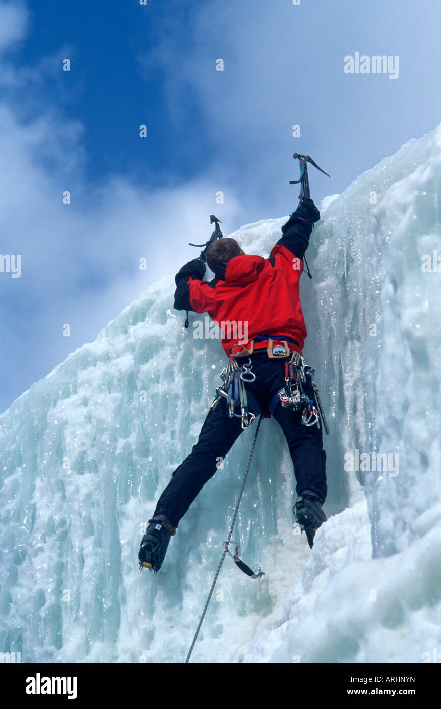 Ice climbers on rocky Mountain ice Stock Photo Alamy