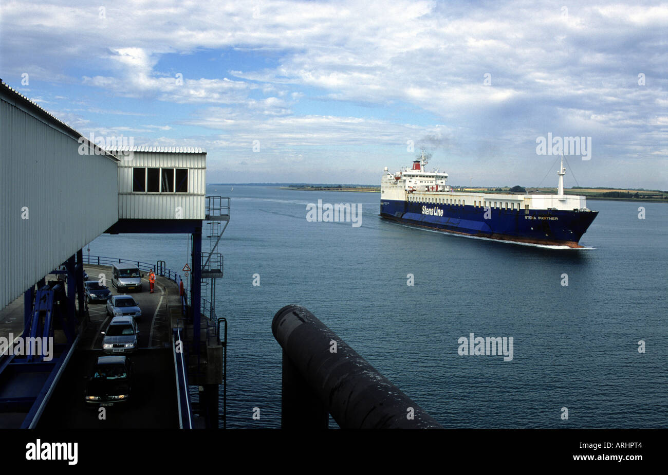 Cars being loaded onto a car ferry at the port of Harwich, Essex, UK