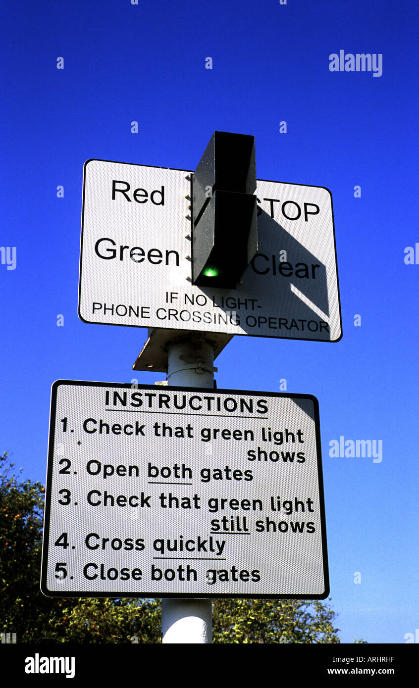Sign At Unmanned Railway Level Crossing Somerton Oxfordshire England Uk Stock Photo Alamy