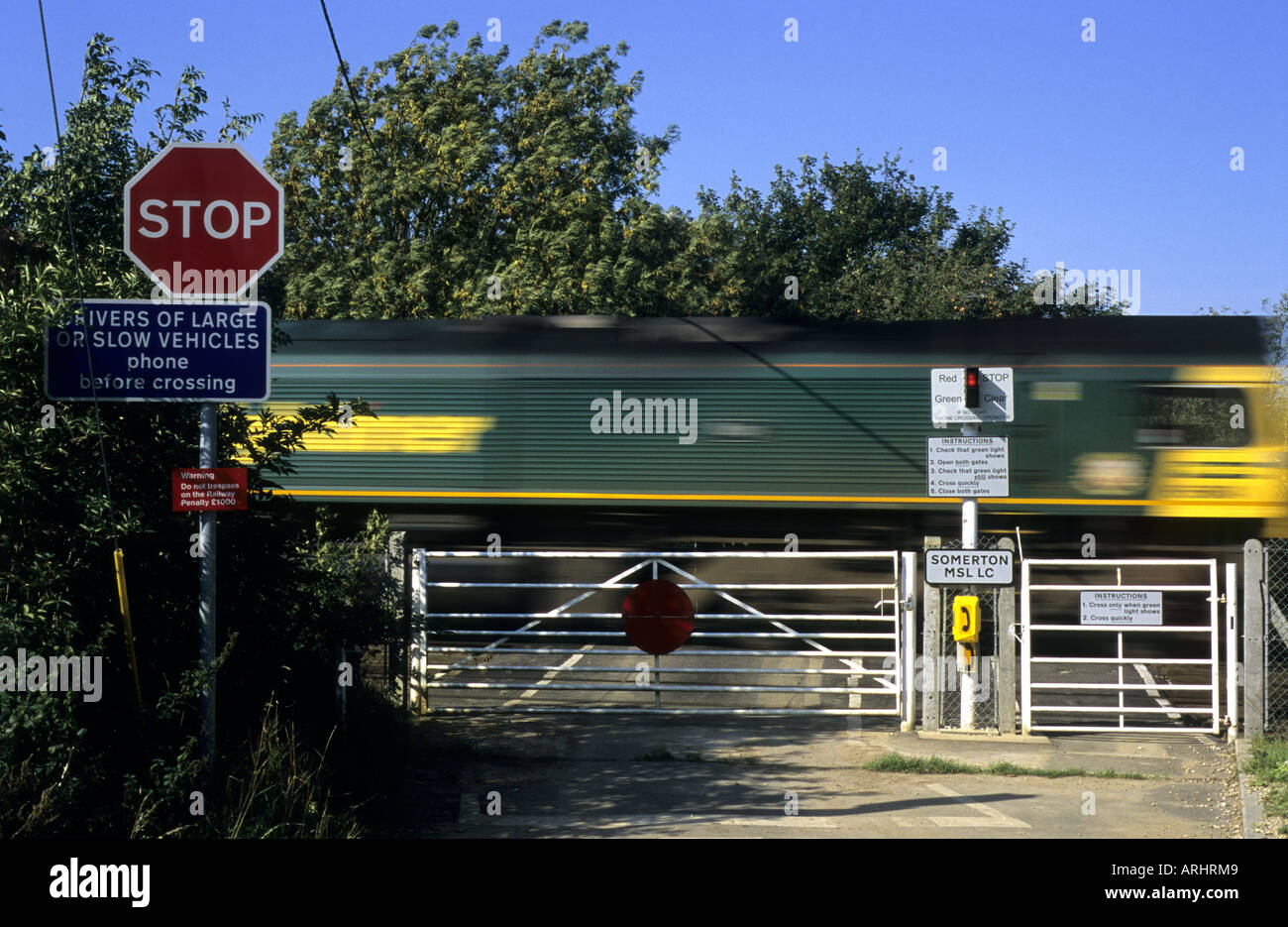 Unmanned railway level crossing at Somerton, Oxfordshire, England, UK Stock Photo
