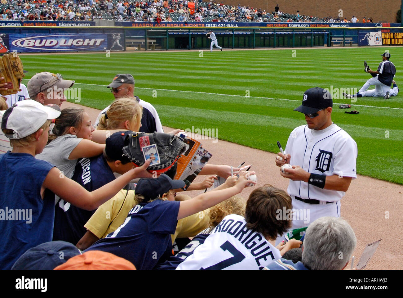 Players sign autographs prior to a Detroit Tiger Professional major league Baseball game at
