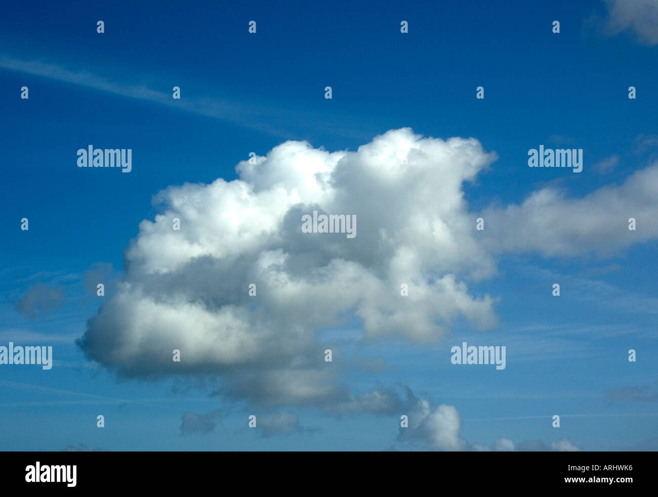 White cloud against a blue sky Stock Photo - Alamy