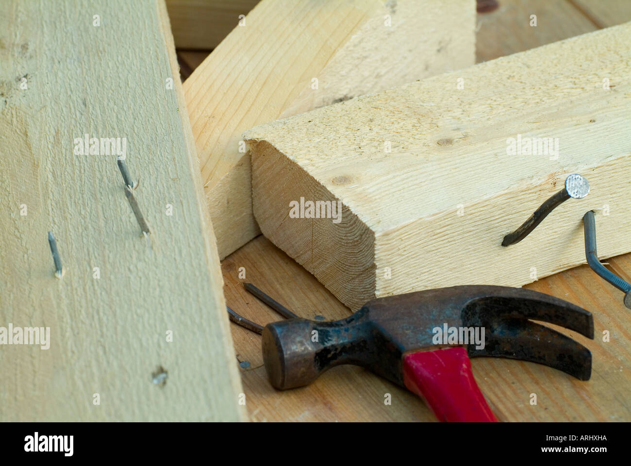 danger for accident dangerous action wood boards planks with nails and