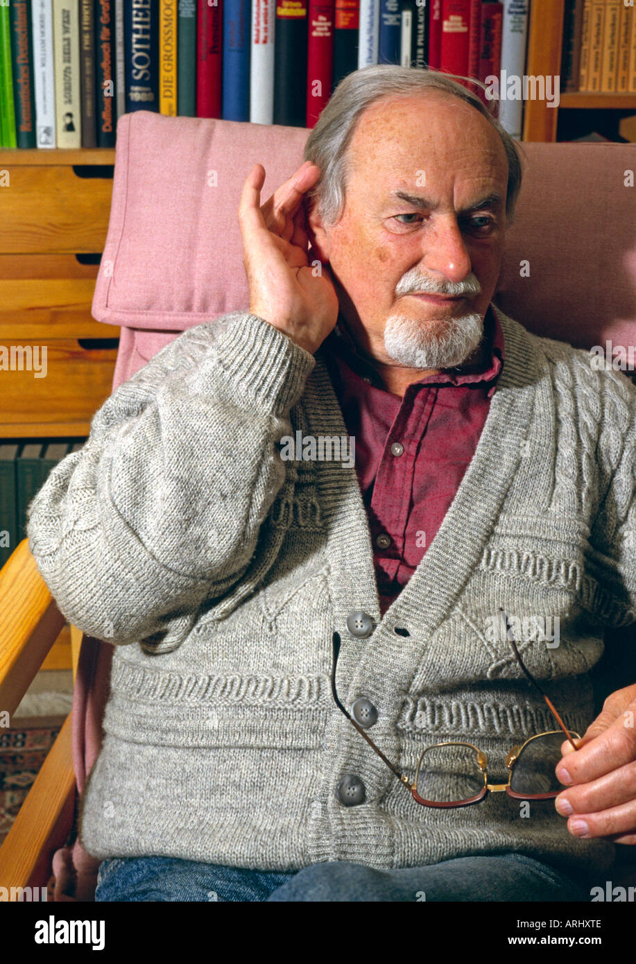 Old man sitting on chair hi-res stock photography and images - Alamy