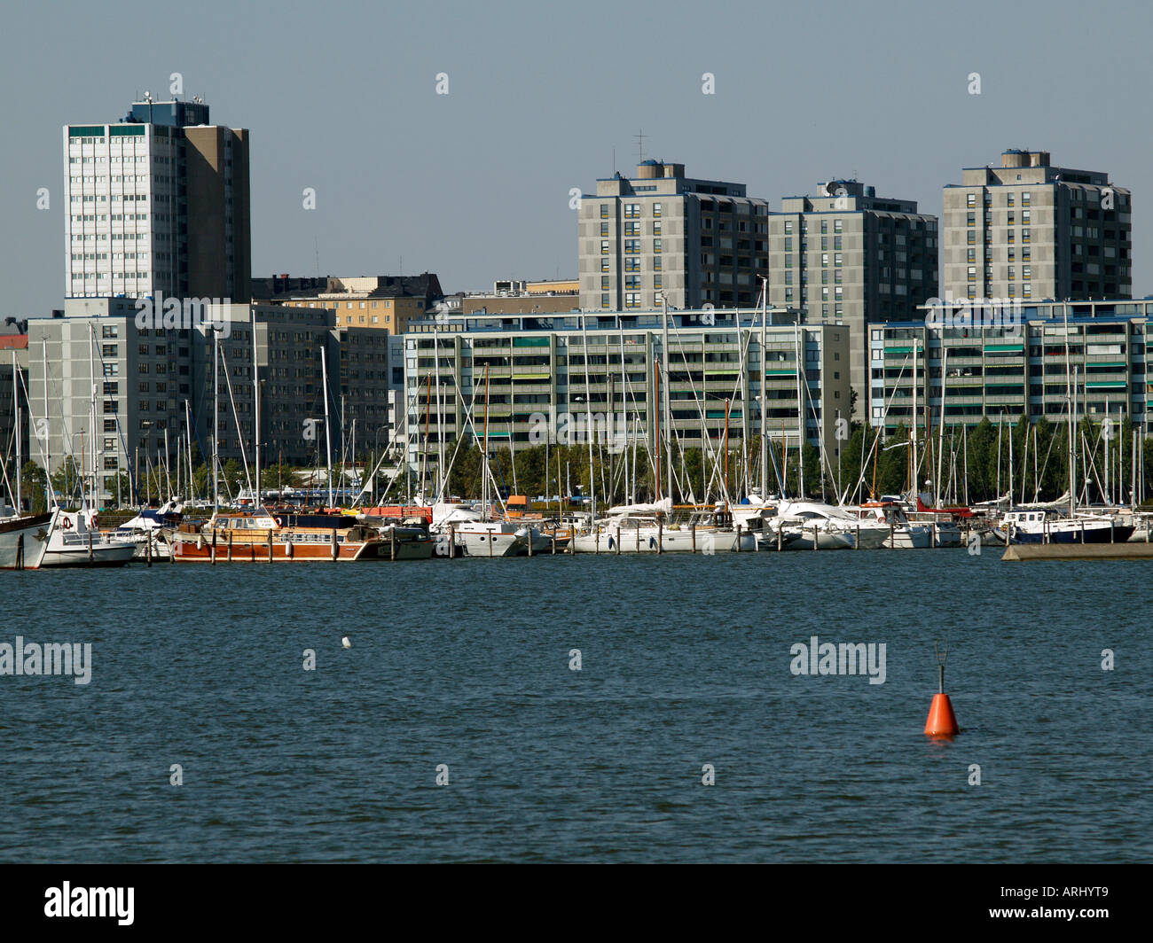 Merihaka part of the town Helsinki with concrete blocks of flats apartement buildings on the shore of the Baltic Sea Stock Photo