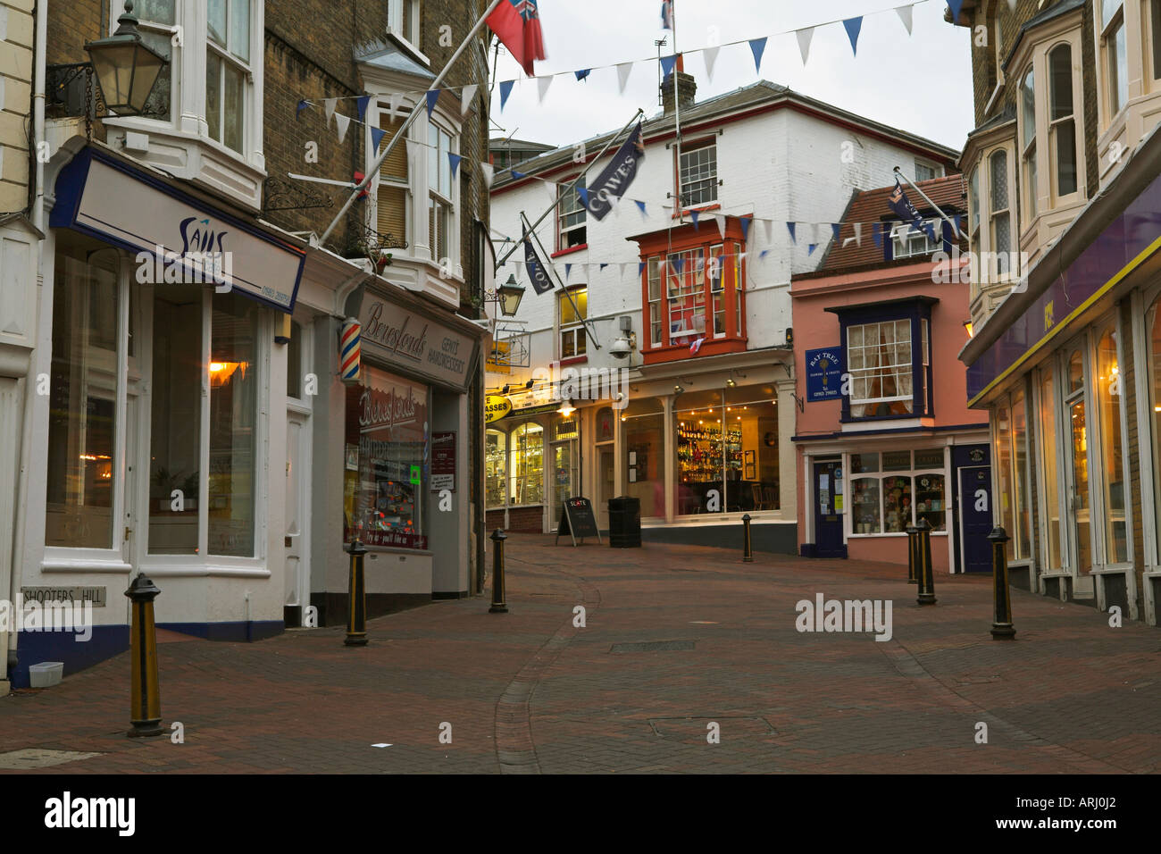 The winding Shooters Hill in the centre of Cowes with preparations for Cowes week well underway Stock Photo