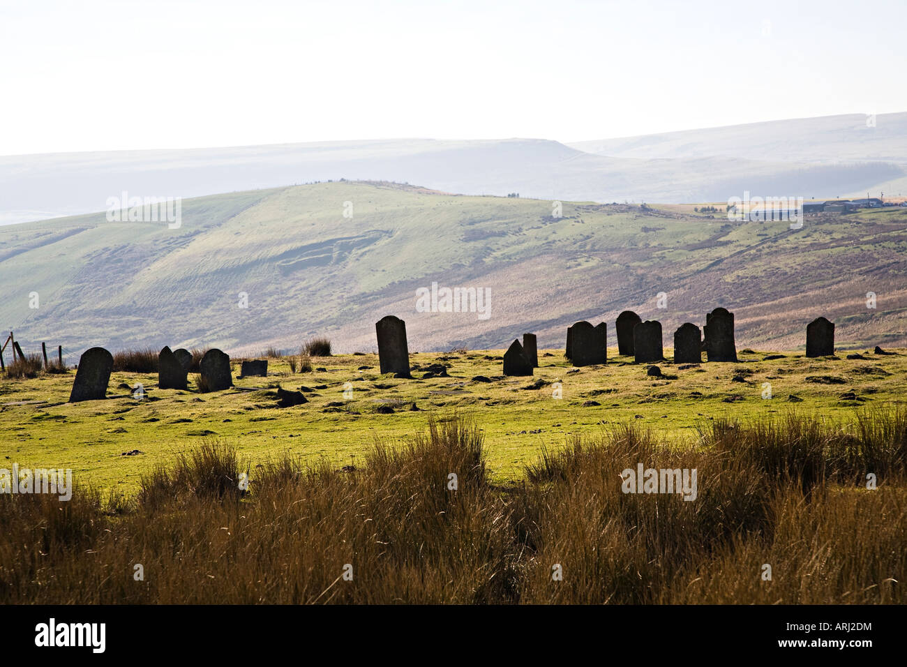 Gravestones in isolated cholera burial ground dated to 1849 on the moors near Tredegar Wales UK Stock Photo