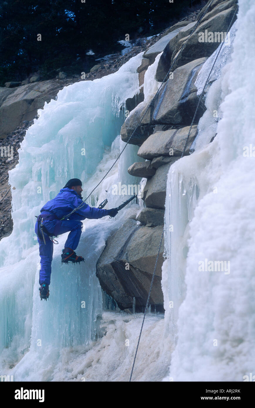 Ice climbers on rocky Mountain ice Stock Photo Alamy