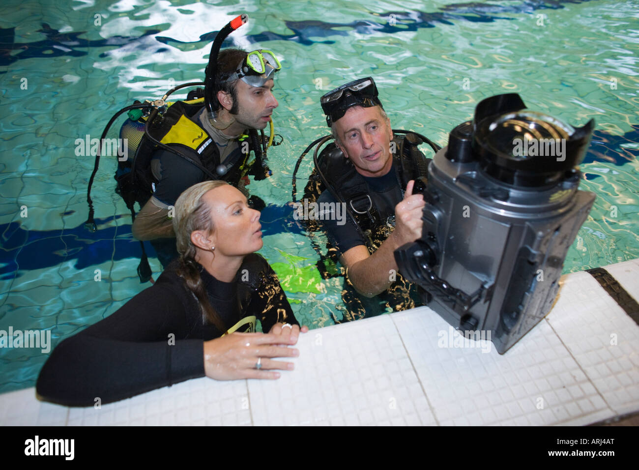 A wildlife cameraman teaches underwater filming techniques at a seminar