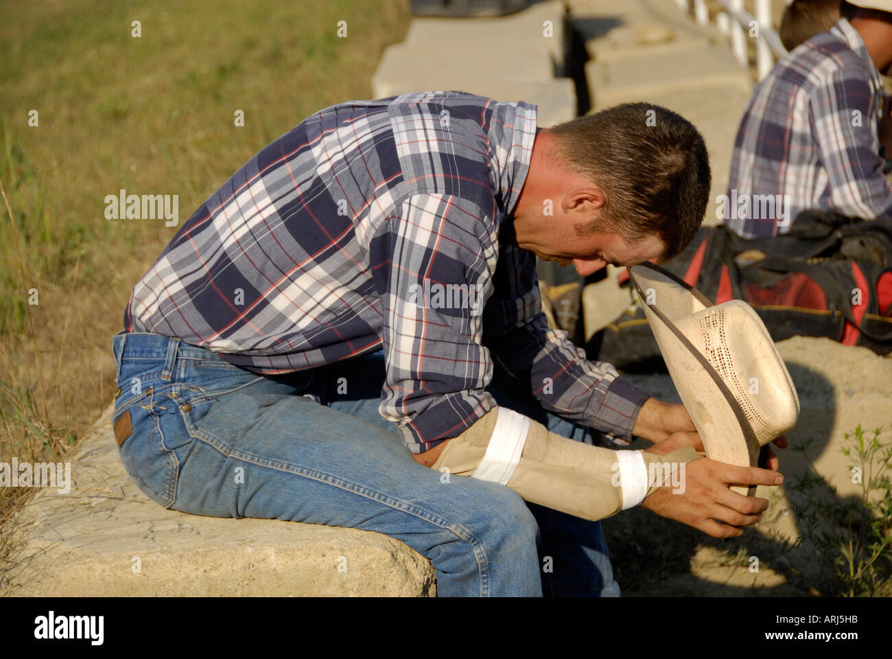 Cowboys emotionally prepare for a Rodeo event Stock Photo