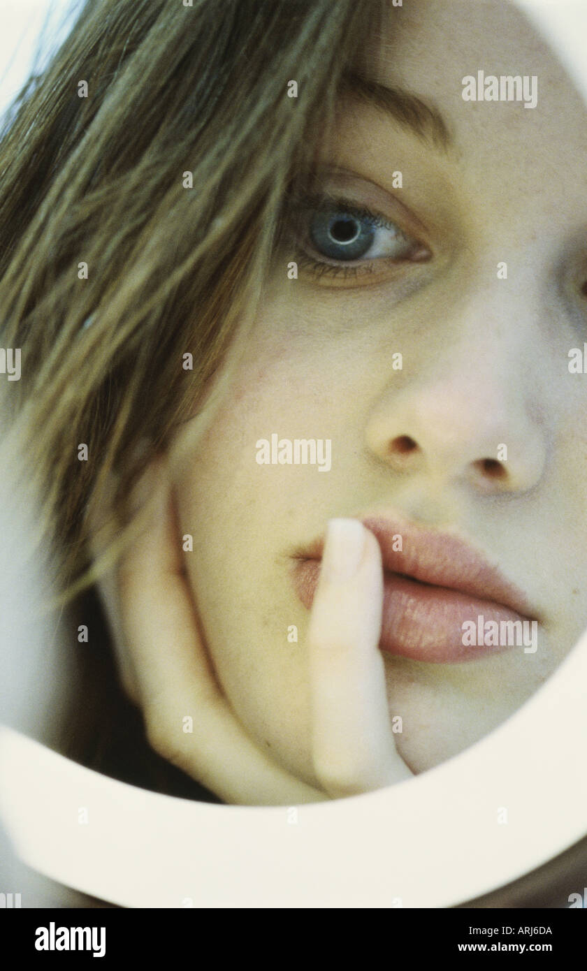Woman gazing mirror reflecting hi-res stock photography and images - Alamy