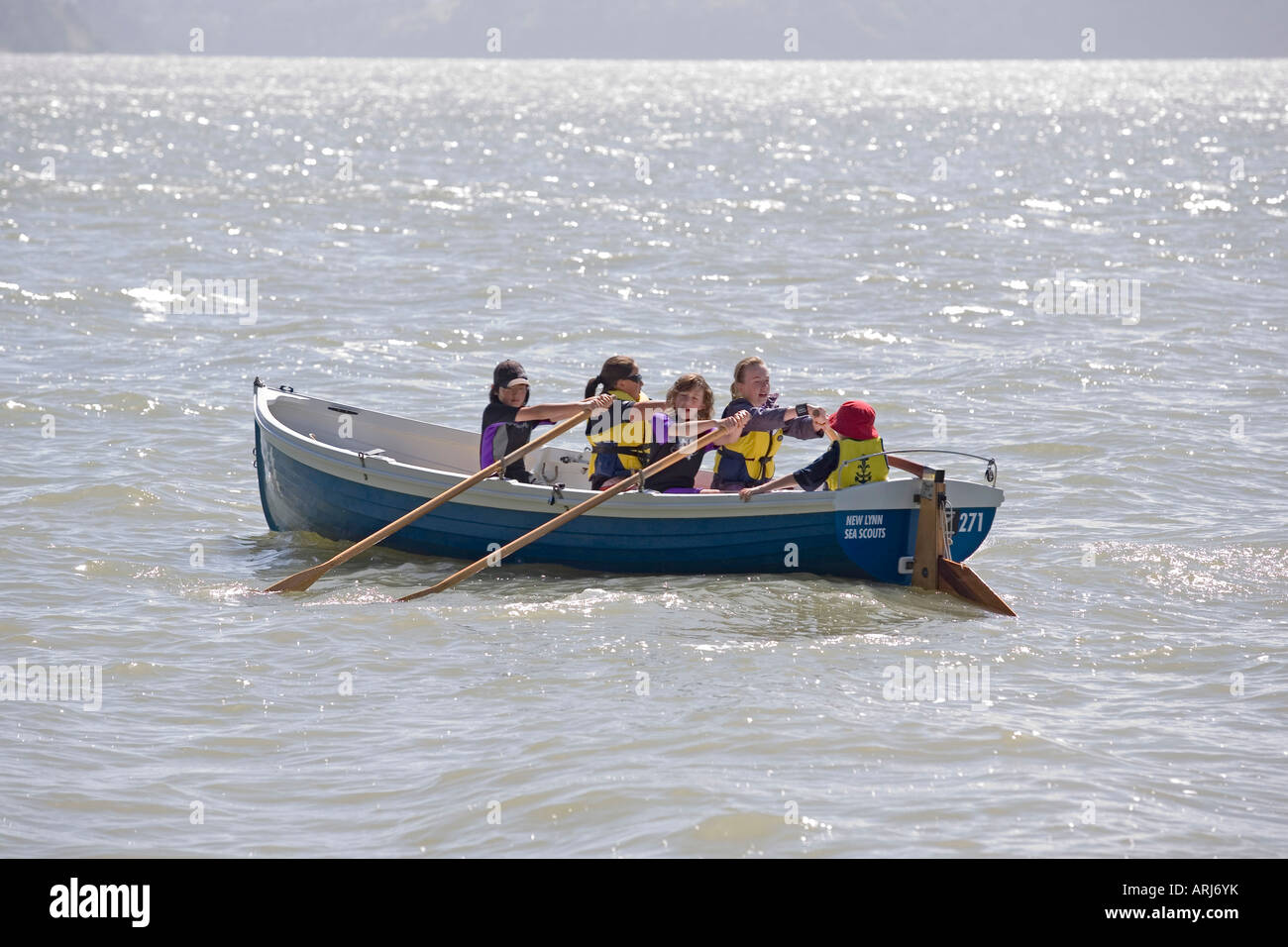 children rowing a row boat from the New Lynn Sea Scouts Stock Photo