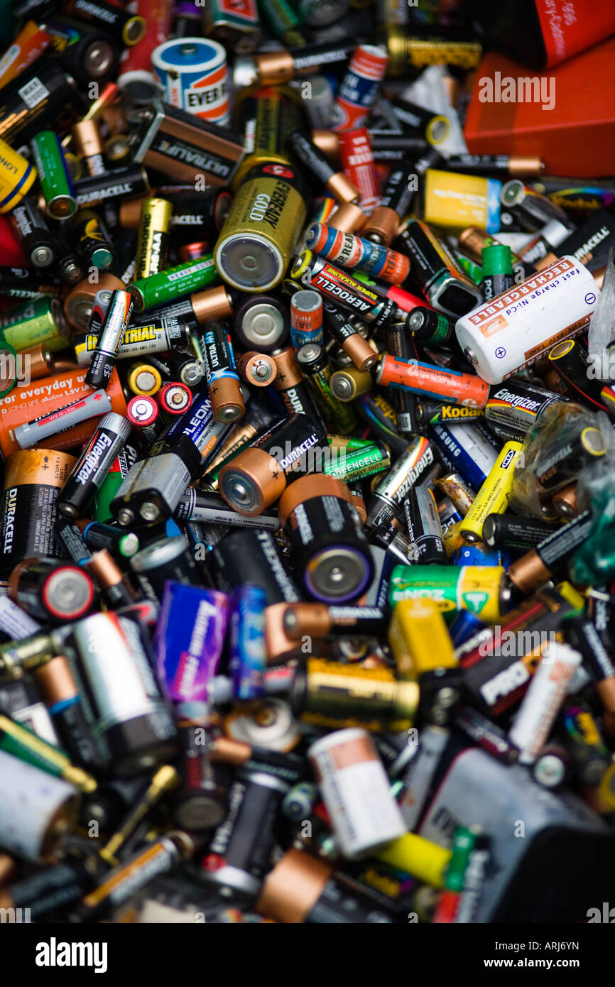 Used disposable batteries for recycling at a recycling centre, UK Stock Photo