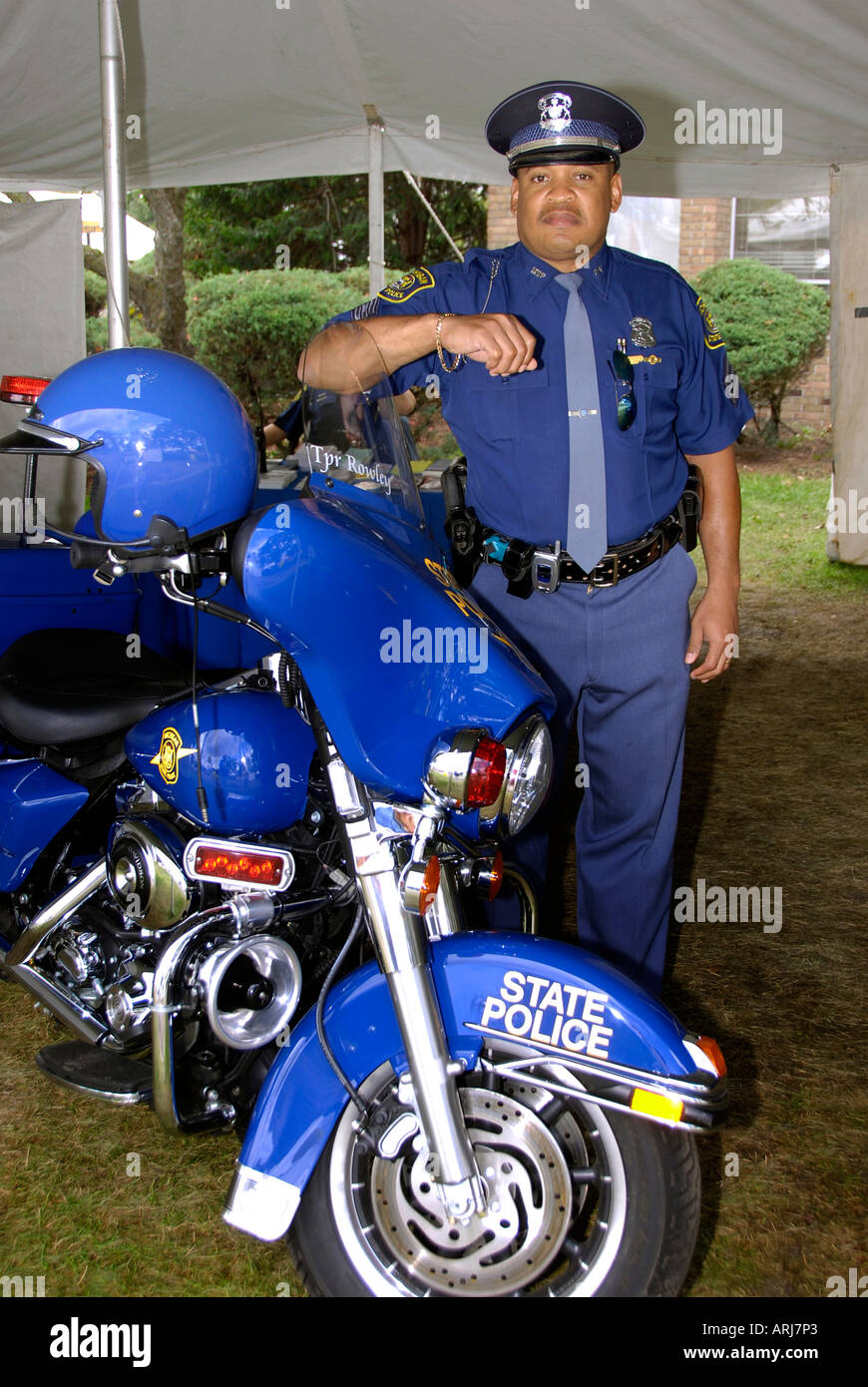 Michigan State Police participate with motorcycle policeman at Michigan State Fair Held at Detroit Michigan MI Stock Photo