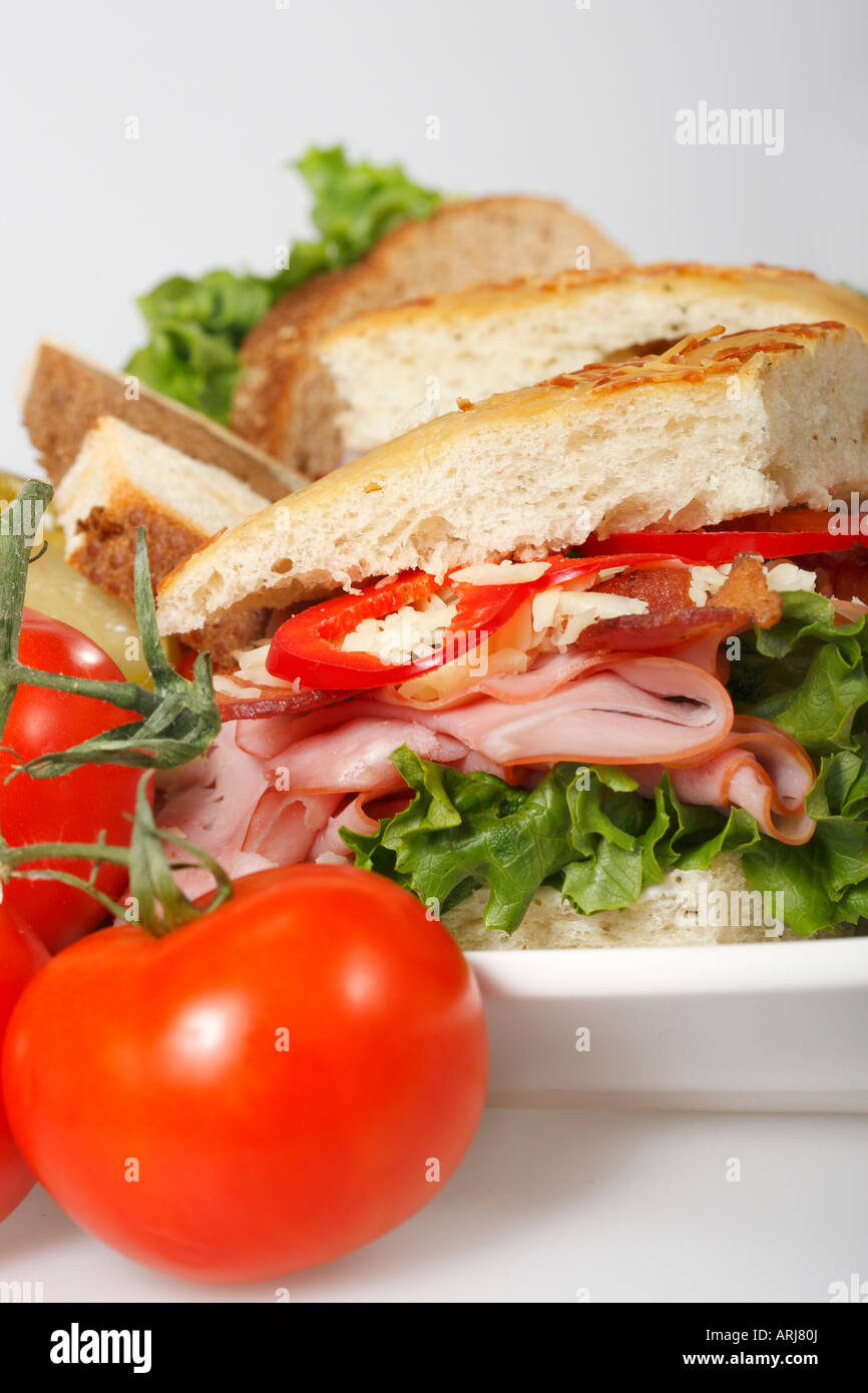 Platter of sandwiches on white background with vegetables Focaccia ...