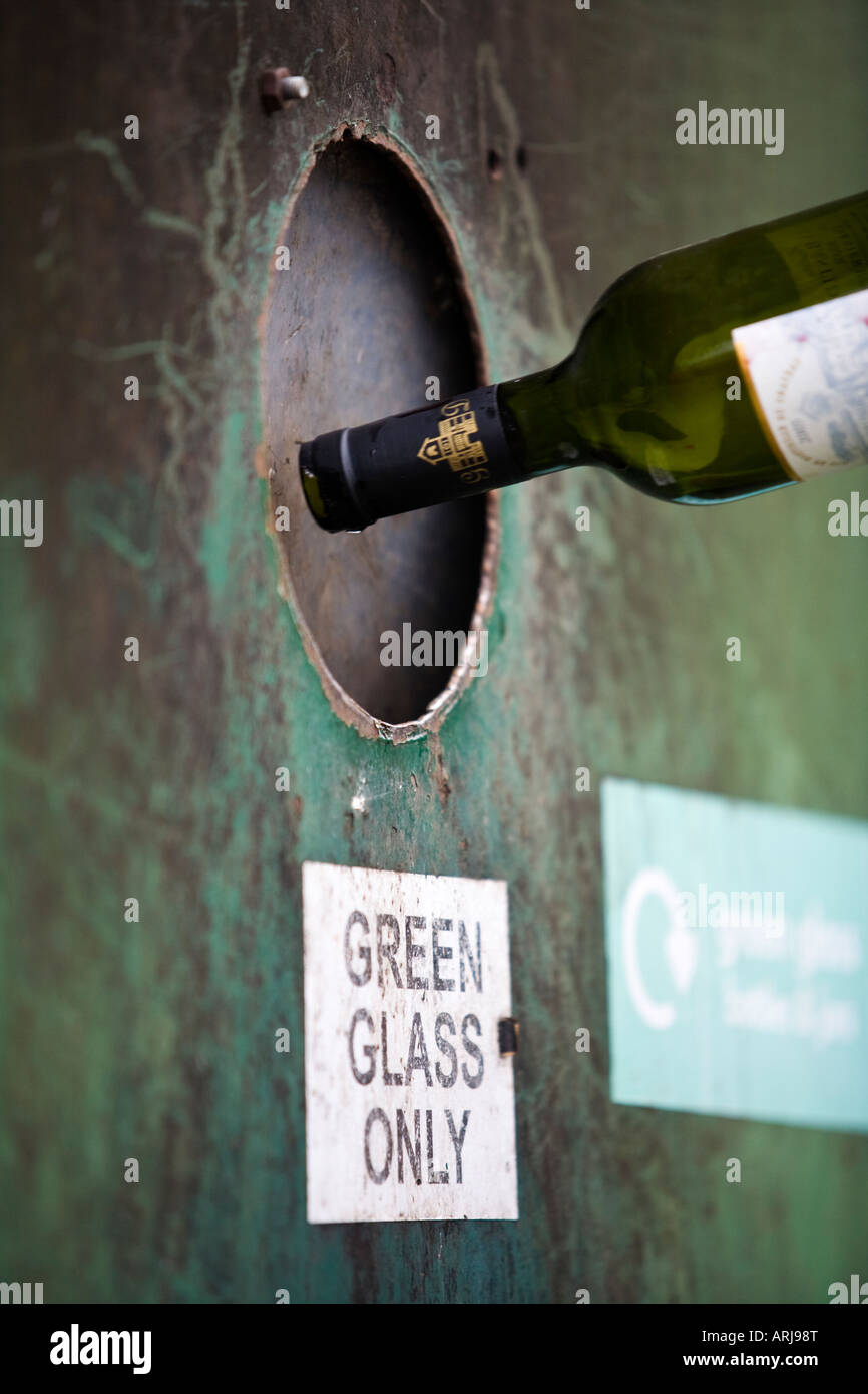Green glass recycling bin at a recycling centre, UK Stock Photo Alamy