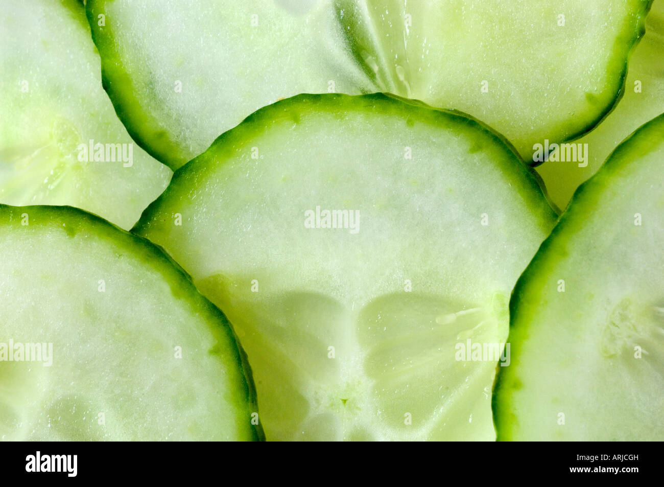 organic Cucumber Slices placed to form a geometric pattern Stock Photo