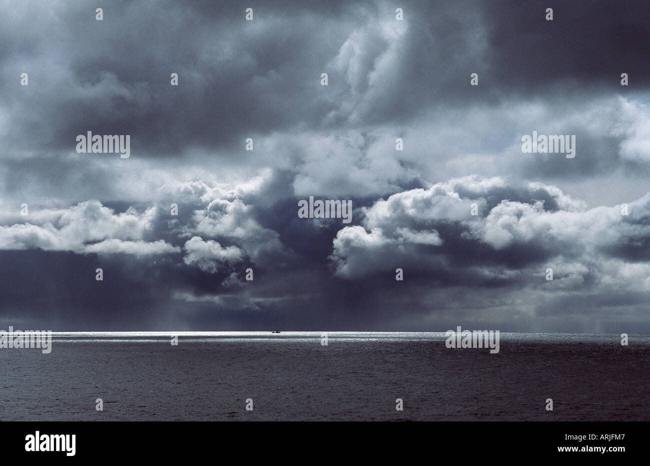dramatic clouds, over the ocean Stock Photo