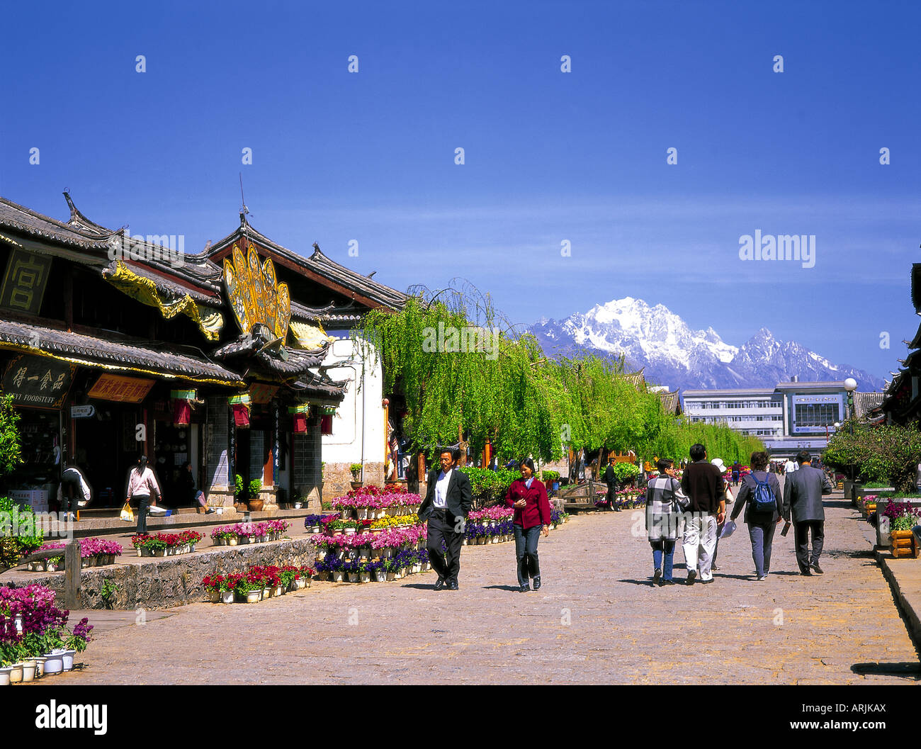 Main street of Lijiang Old Town, in China’s Yunnan Province Stock Photo ...