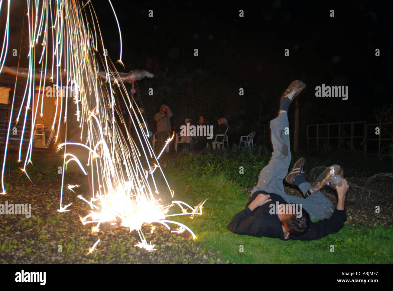 How not to light a firework on Bonfire night England UK Stock Photo Alamy