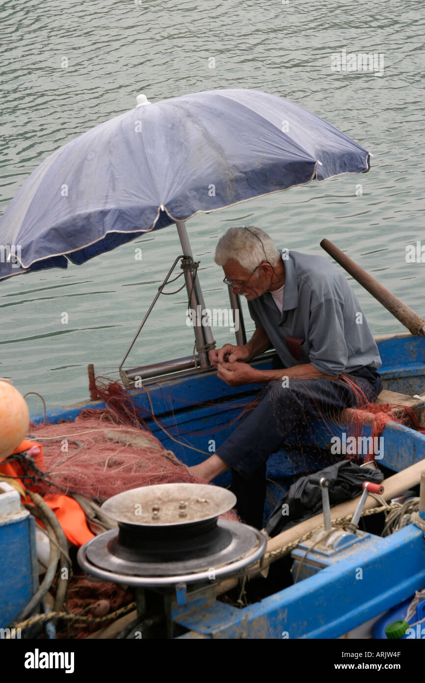 Fisherman umbrella hi-res stock photography and images - Alamy