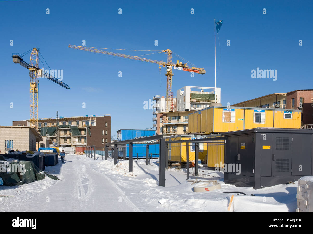 Construction site at Winter with temporary living quarters for the