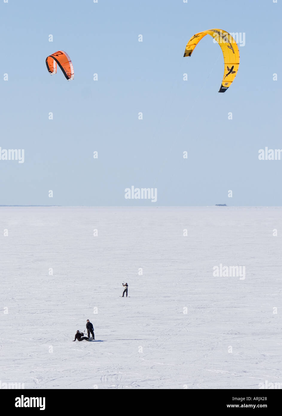 Kite boarding on sea ice at Wintertime , Finland , Gulf of Bothnia , Oulu Stock Photo