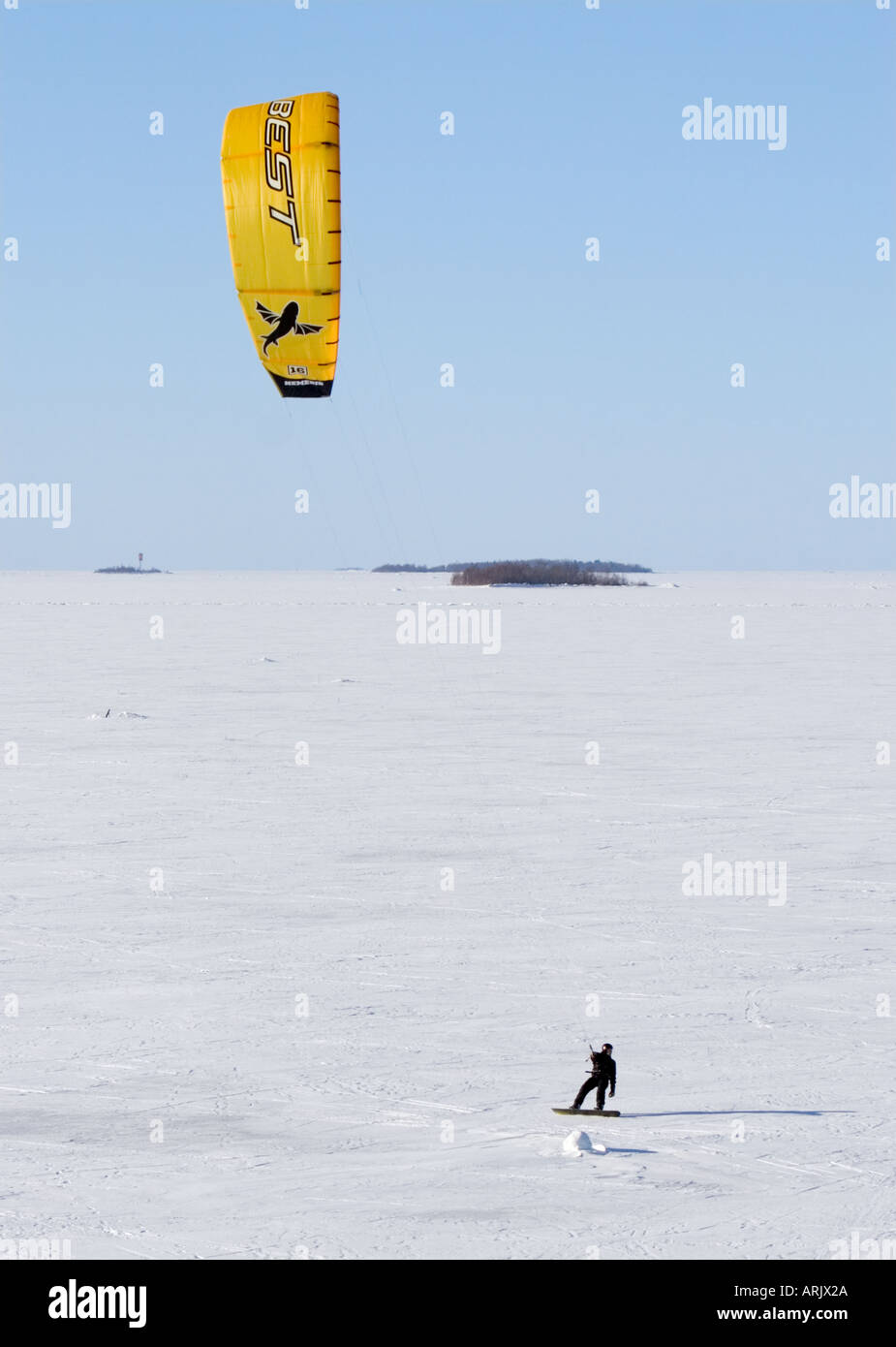 Kite boarding on sea ice at Wintertime , Finland Gulf of Bothnia , Oulu Stock Photo