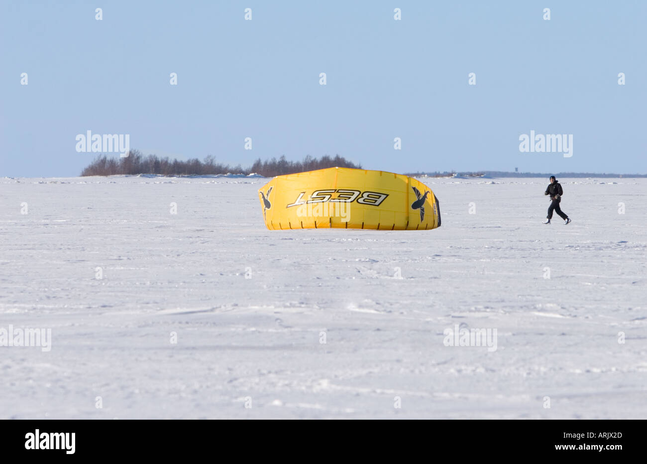 Kite boarding on sea ice at Wintertime , Finland Stock Photo