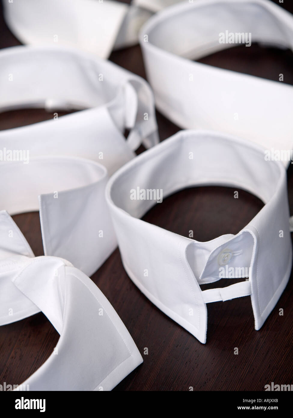 Various styles of gentlemans shirt collars all white Stock Photo
