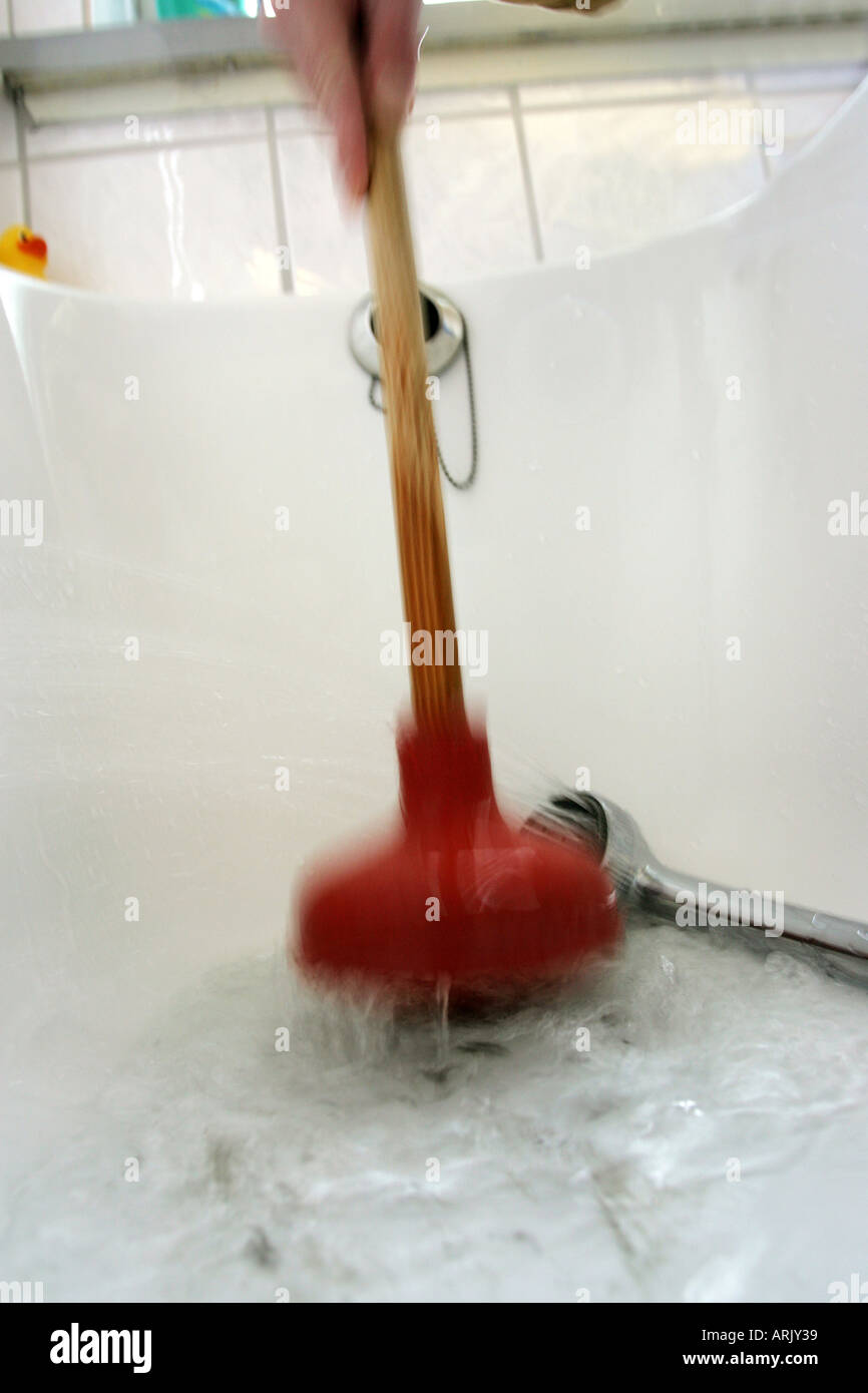 DEU, Germany Housecleaning in a private house/apartment. Cleaning of a blocked outflow in a