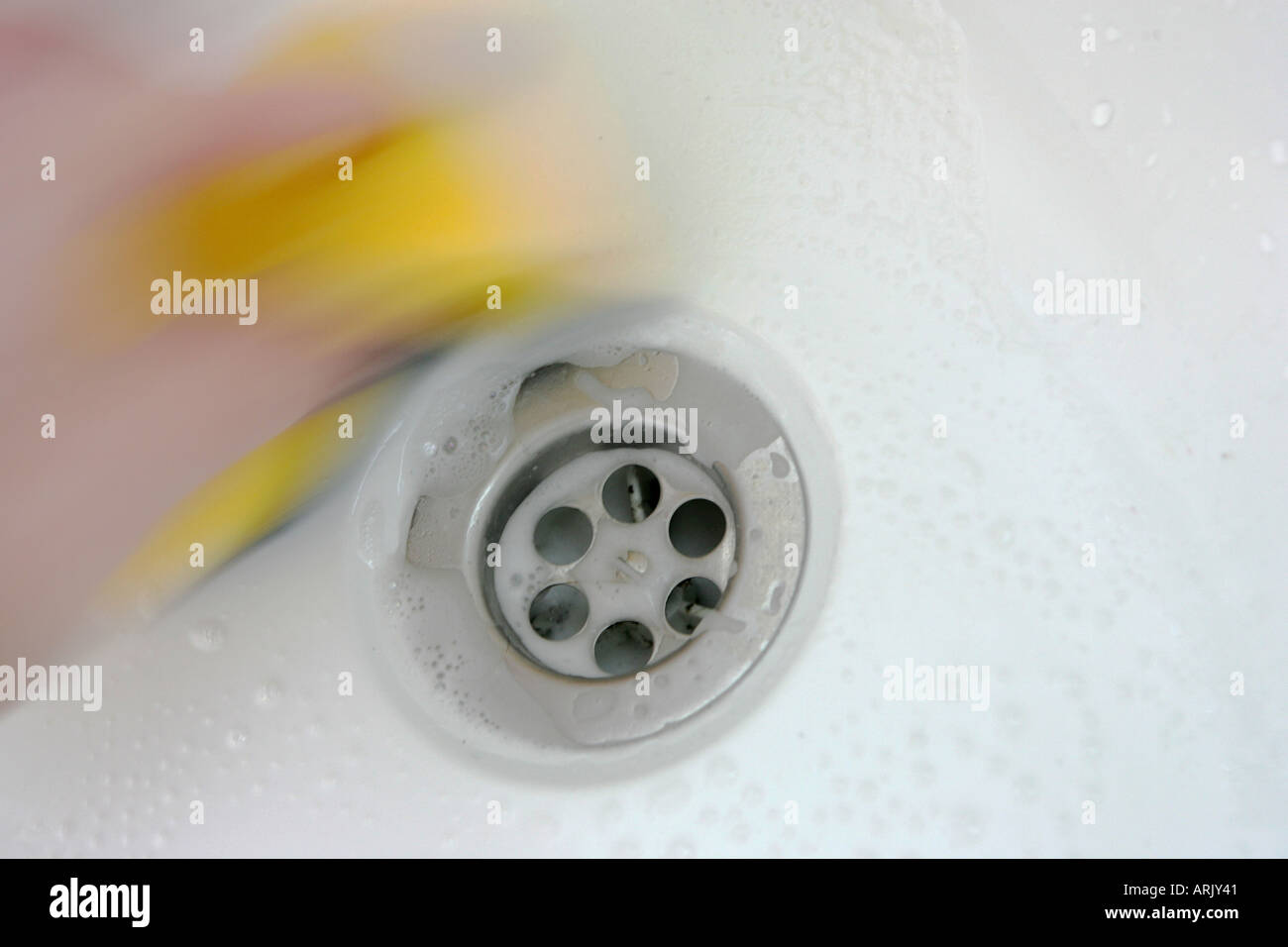 DEU, Germany : Housecleaning in a private house/apartment. Cleaning in the bathroom Stock Photo