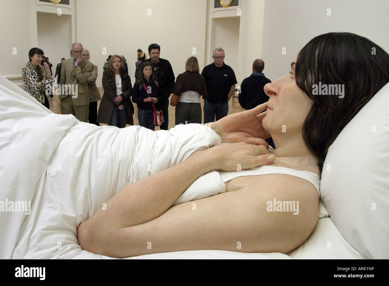 One of Ron Mueck s sculptures In Bed on show during the festival in Edinburgh Scotland August 2006 Stock Photo