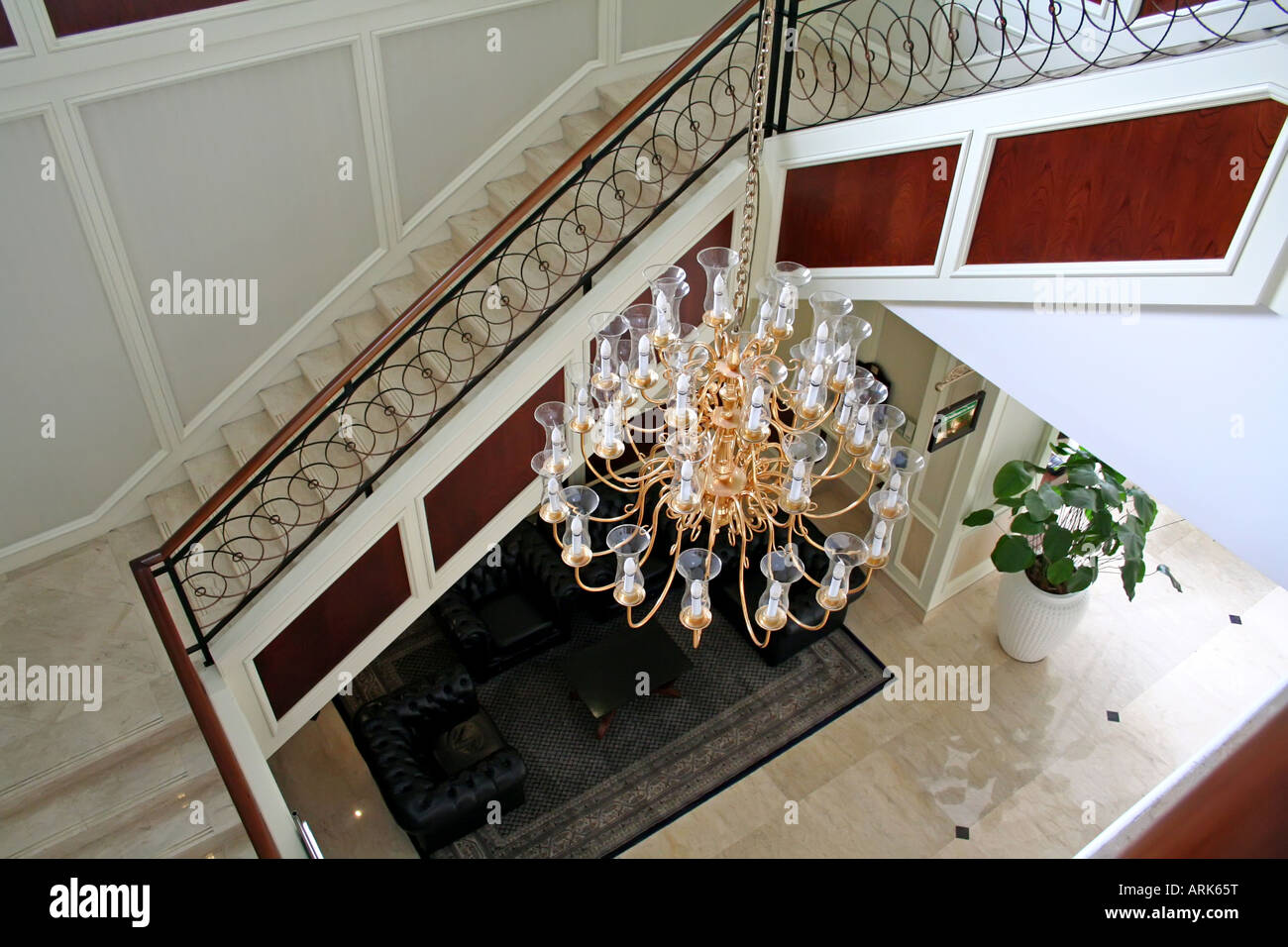 Elegant chandelier and staircase luxurious interior design Stock Photo