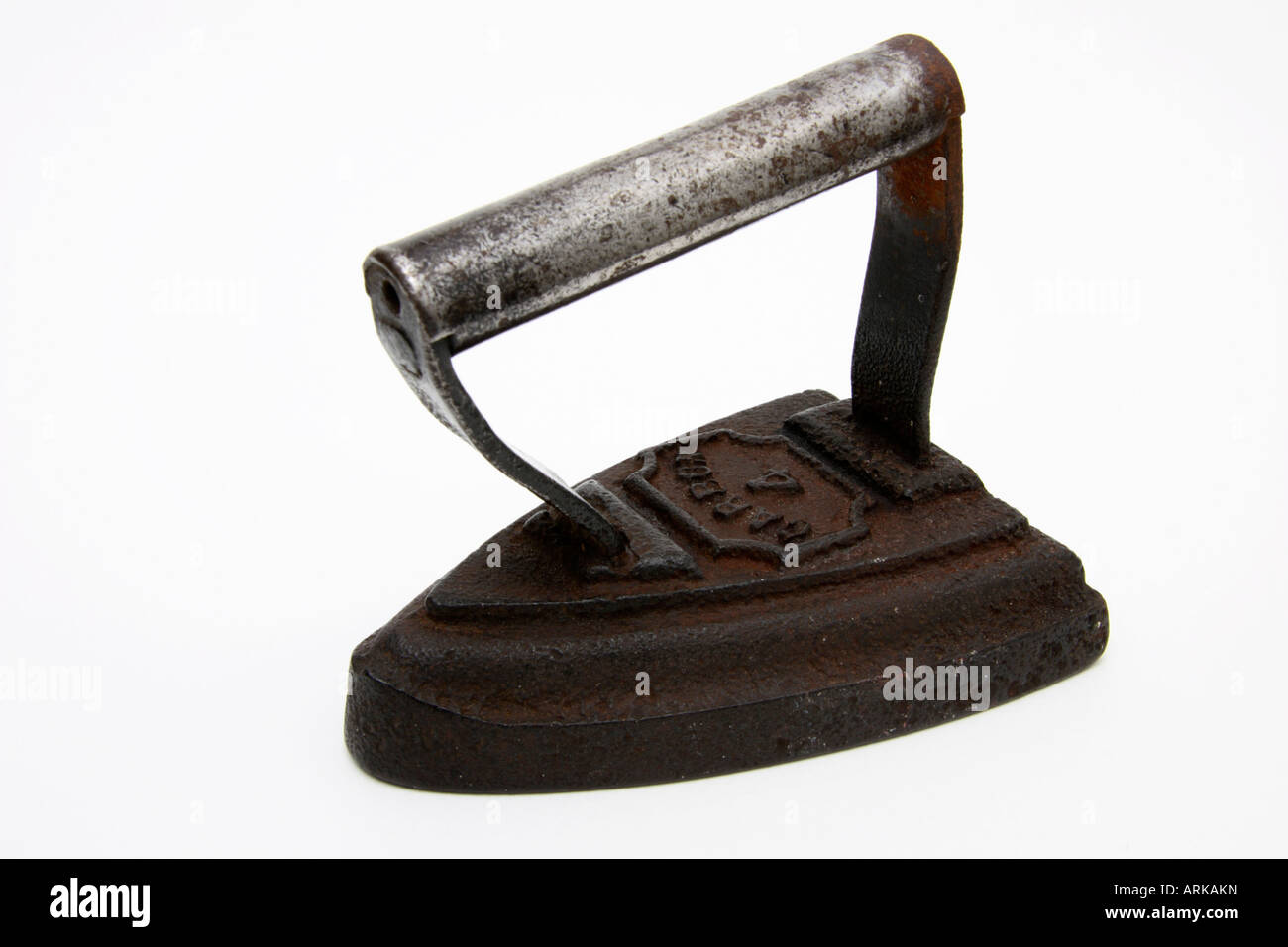 An old Victorian antique domestic smoothing iron. Stock Photo