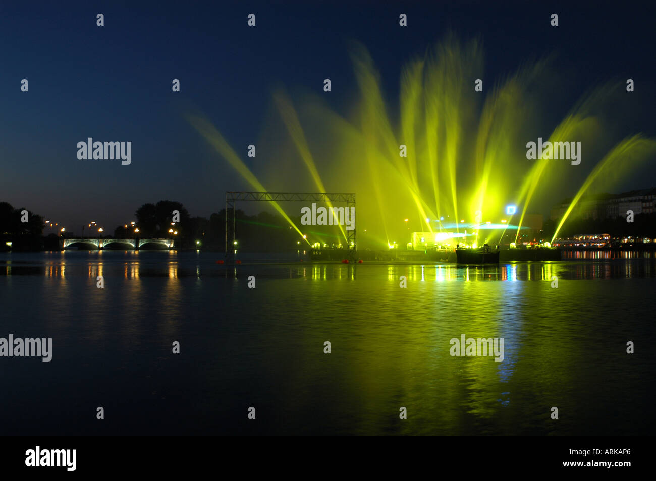 Gorgeous water, light and laser show on lake Binnenalster during the football world cup 2006. On the left the bridge 'Lombardsbr Stock Photo
