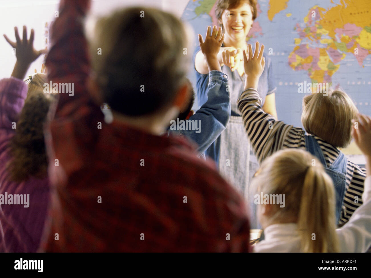 Raise hands classroom hi-res stock photography and images - Alamy