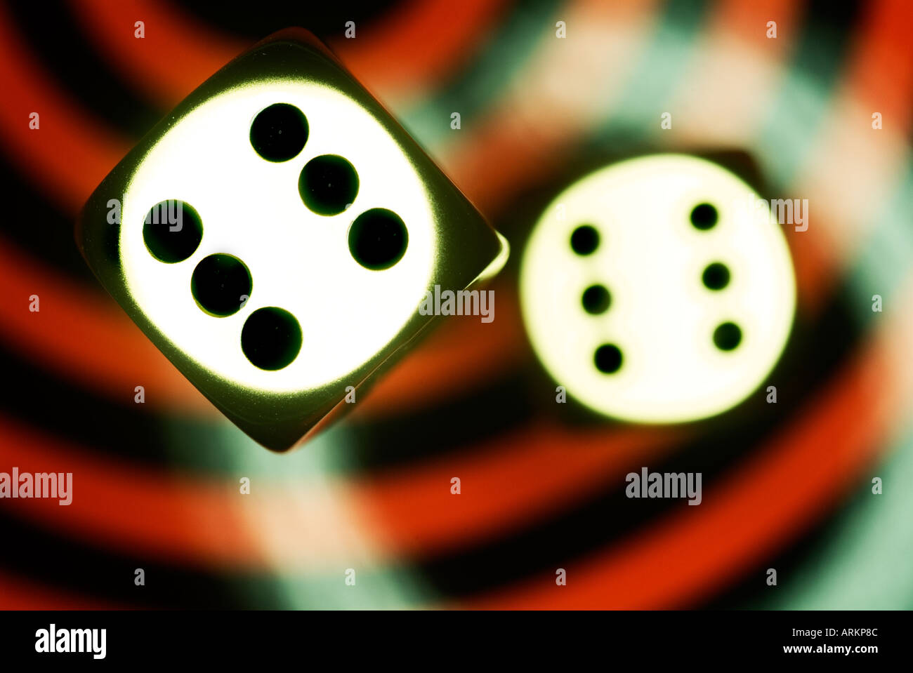 two metal dice on contemporary background Stock Photo