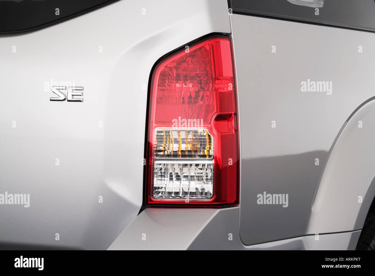 2008 Nissan Pathfinder SE in Silver - Tail light Stock Photo