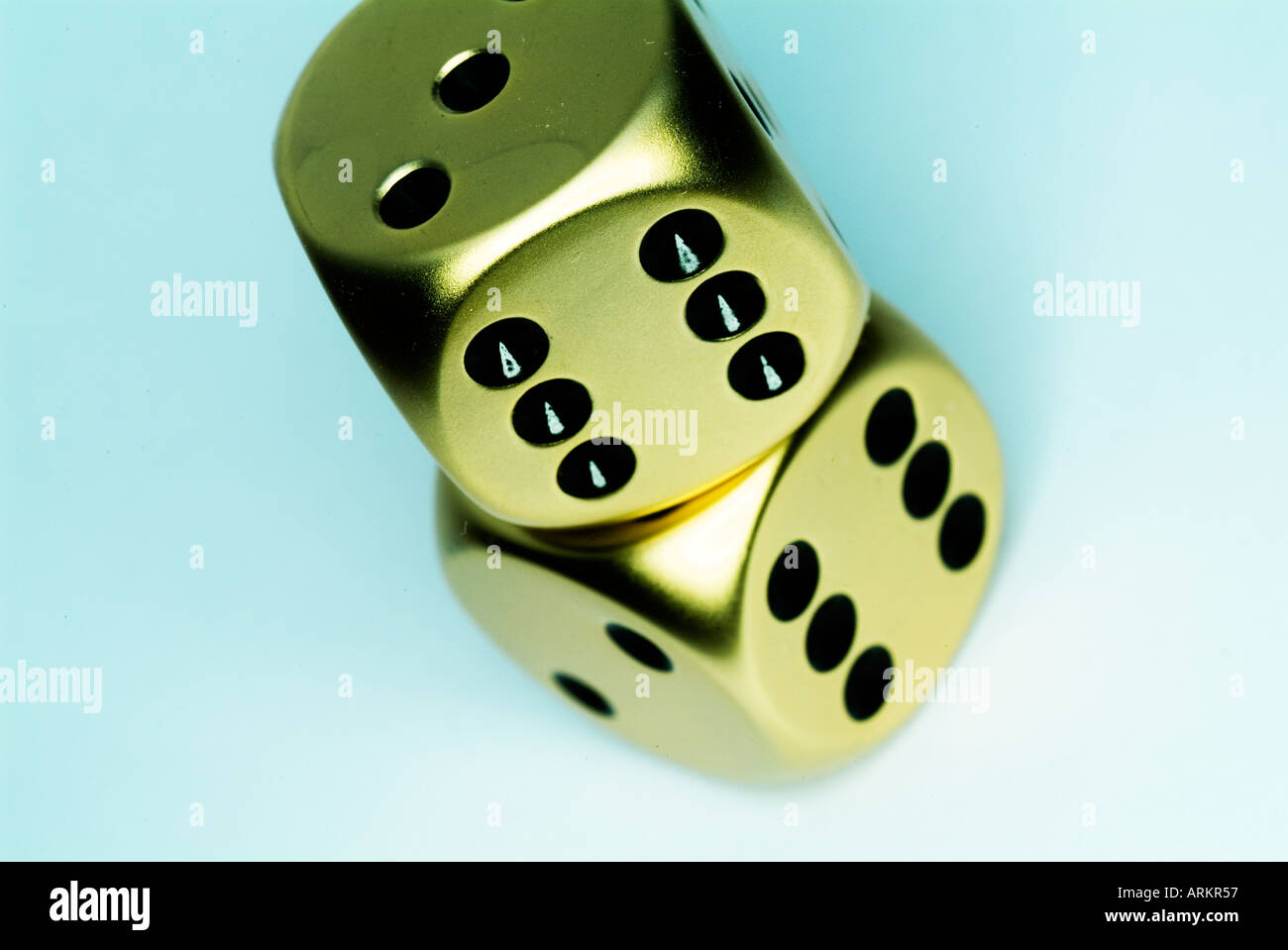 two gold dice Stock Photo